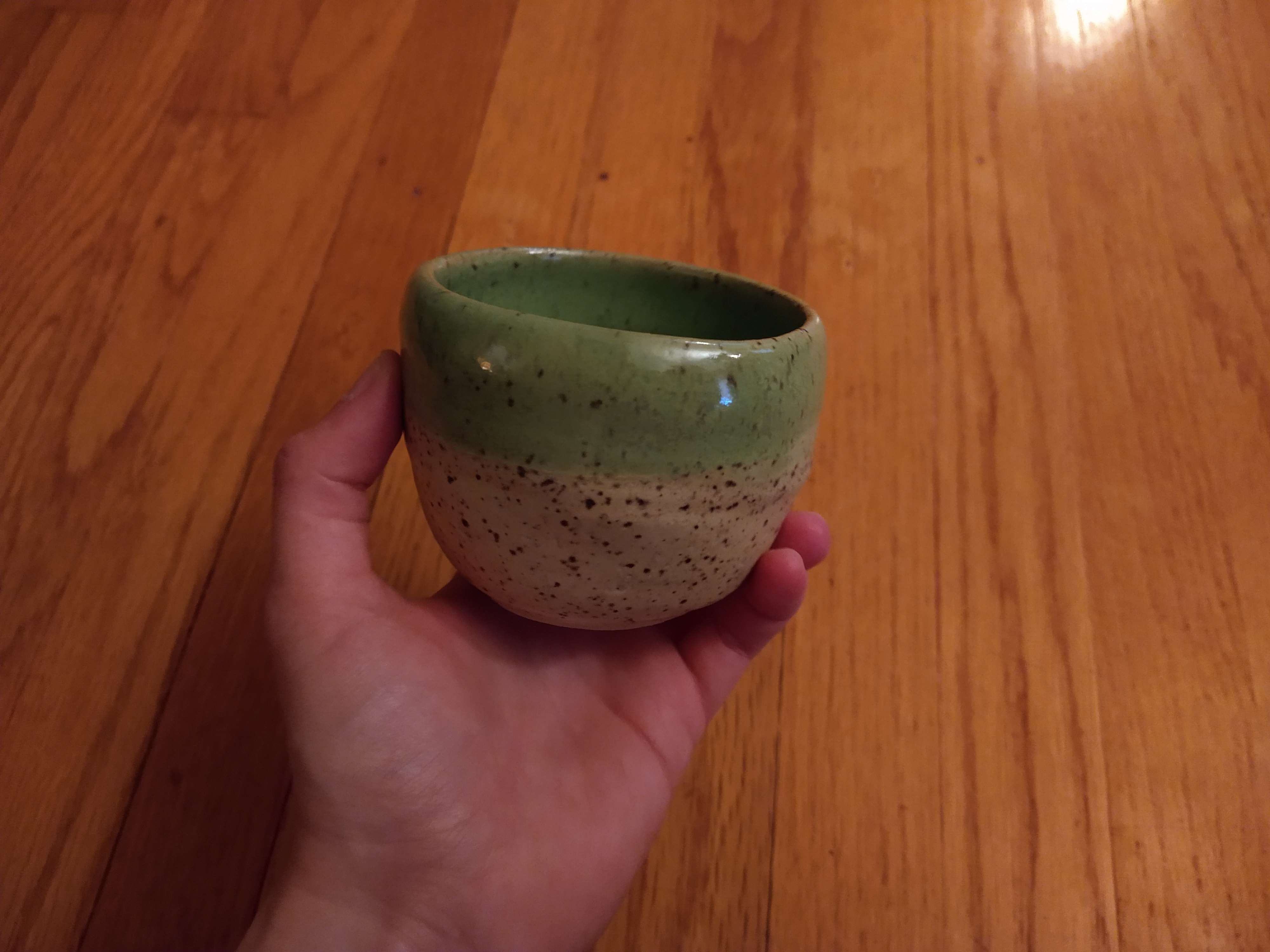A green and white cup.